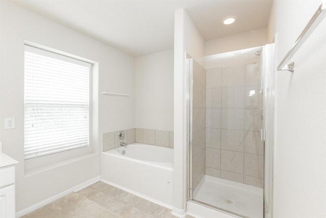 bathroom with vanity, separate shower and tub, and tile patterned flooring