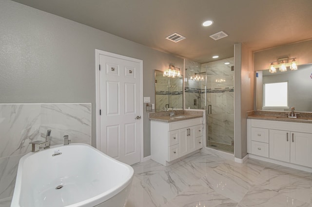 bathroom with independent shower and bath and vanity