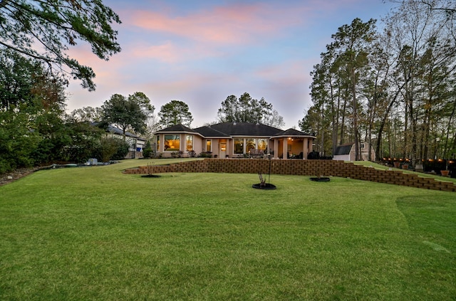 exterior space with a yard