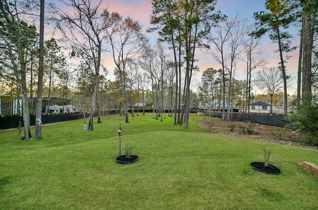 surrounding community featuring a yard