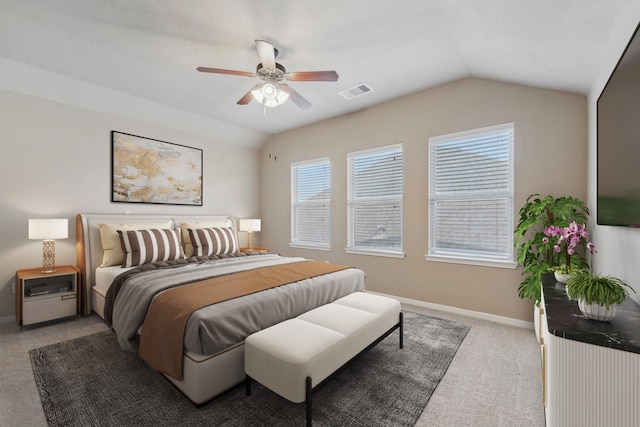 carpeted bedroom featuring ceiling fan and lofted ceiling