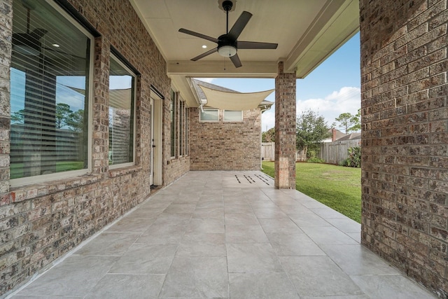 view of patio / terrace featuring ceiling fan