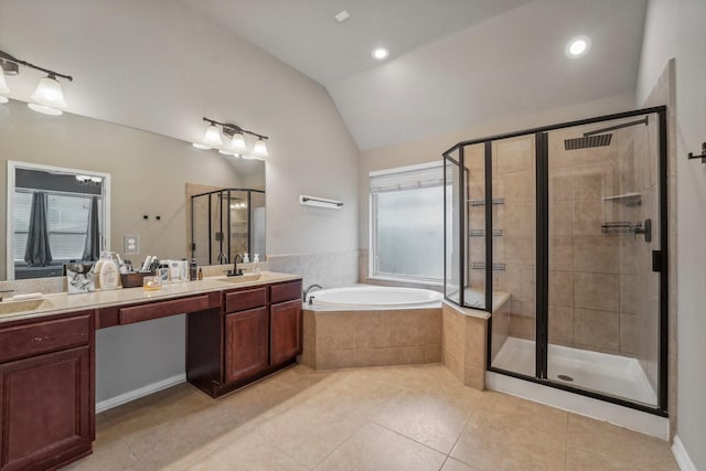 bathroom featuring vanity, vaulted ceiling, tile patterned floors, and plus walk in shower