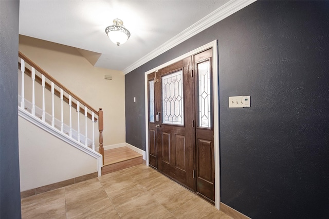 entrance foyer with ornamental molding