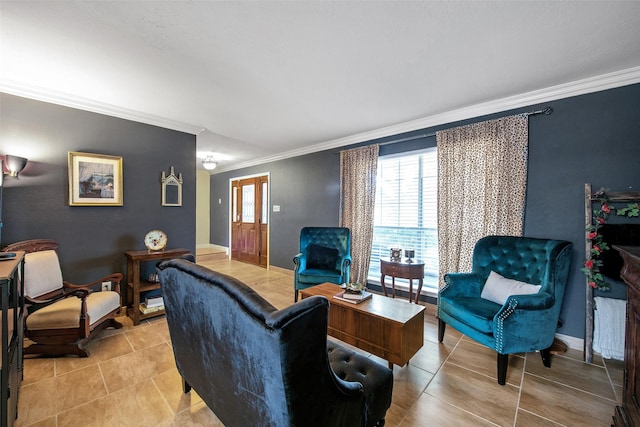 living room with ornamental molding and light tile patterned floors