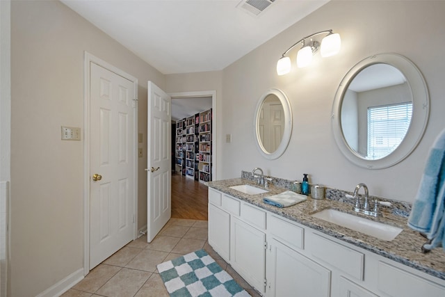 bathroom featuring vanity and tile patterned floors