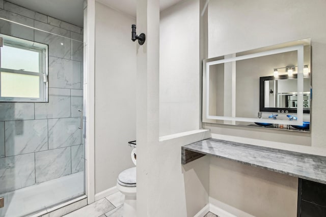 bathroom with toilet, a shower with shower door, tile patterned floors, and vanity