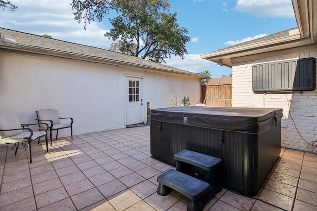 view of patio with a hot tub