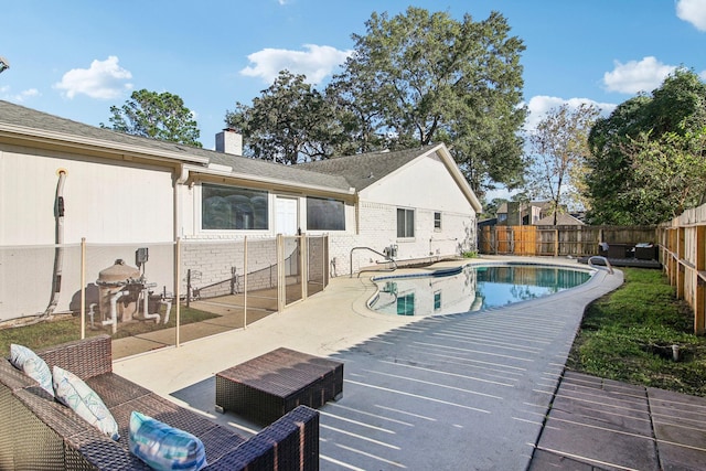 view of pool featuring a patio area