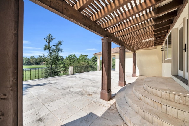 view of patio featuring a pergola