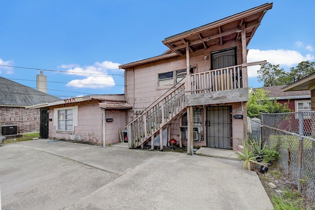 view of front of home with central air condition unit