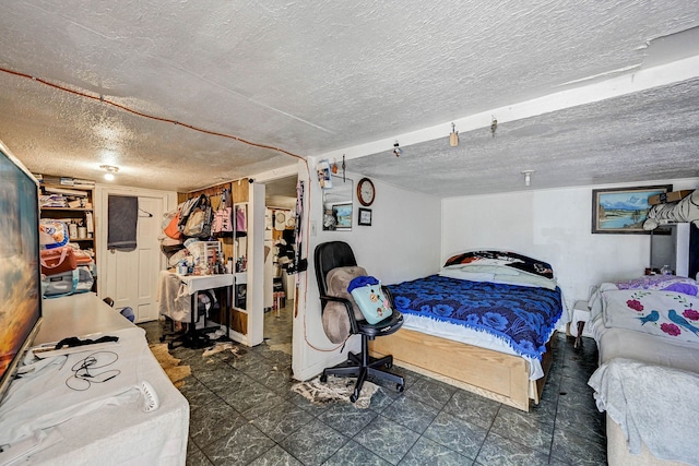 bedroom with a textured ceiling