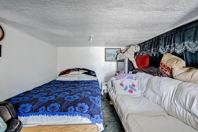 bedroom featuring a textured ceiling