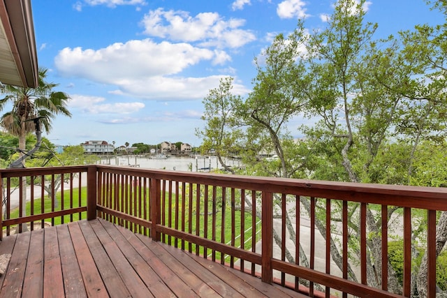 deck featuring a water view