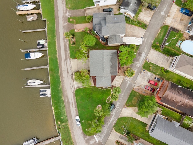 birds eye view of property featuring a water view