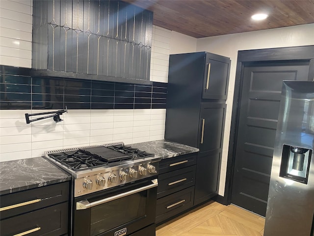 kitchen featuring high end range, decorative backsplash, light parquet floors, dark stone counters, and wooden ceiling