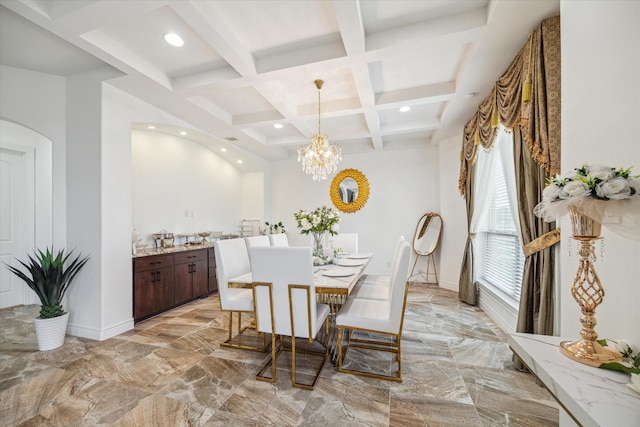 dining space with a chandelier, beamed ceiling, and coffered ceiling