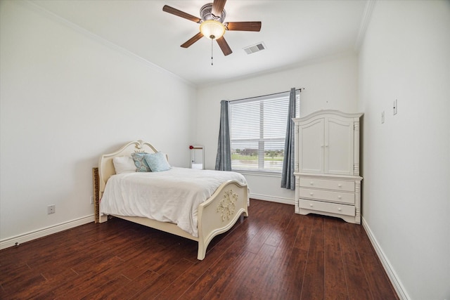 bedroom with dark hardwood / wood-style floors, ceiling fan, and ornamental molding