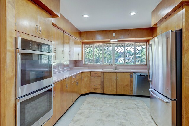 kitchen featuring sink and appliances with stainless steel finishes