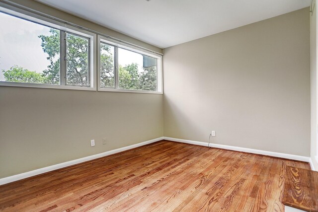 empty room with light wood-type flooring