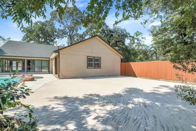 back of property with a patio area