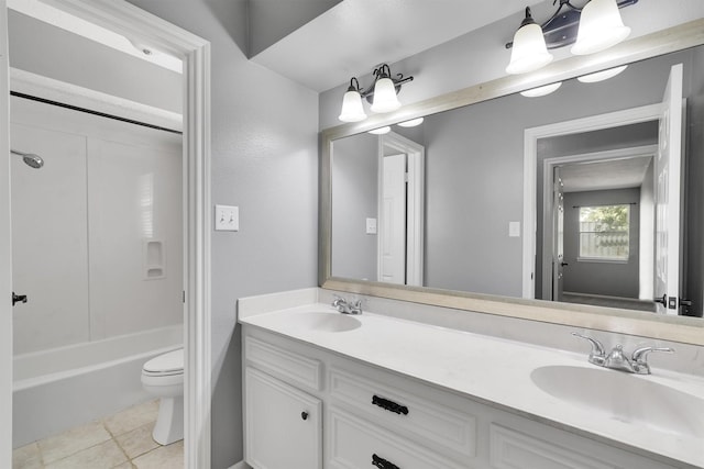 full bathroom featuring toilet, tile patterned floors, shower / tub combination, and vanity