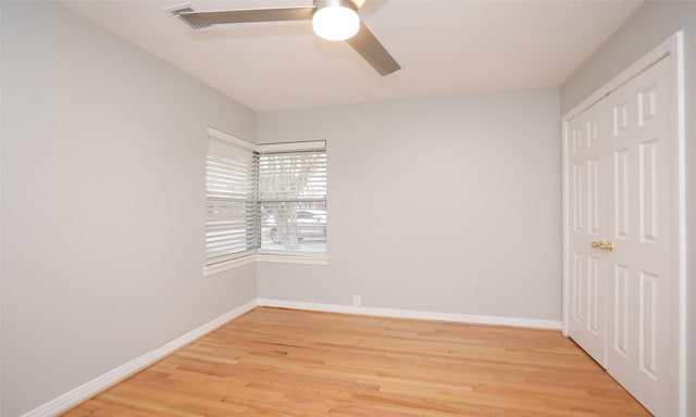 unfurnished bedroom featuring ceiling fan and light wood-type flooring