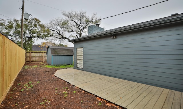 exterior space with a storage shed