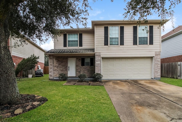 view of front of property featuring a garage and a front lawn