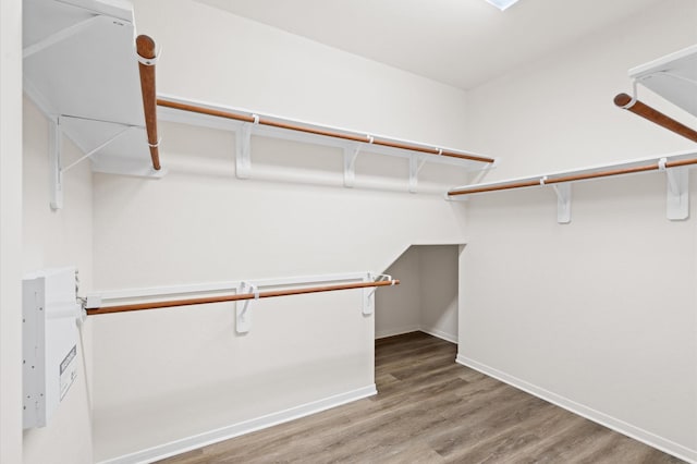 walk in closet featuring wood-type flooring