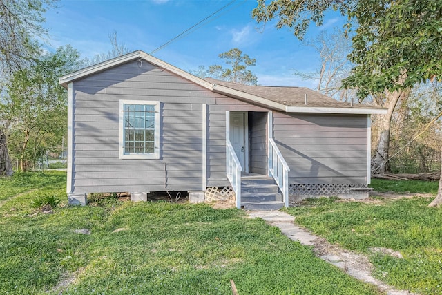 view of front of home with a front yard