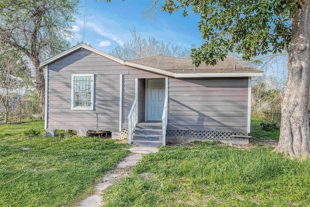 view of front of house with a front yard