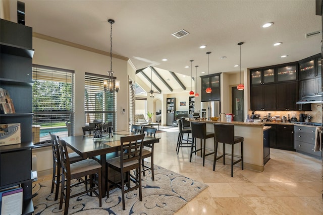 dining area with recessed lighting, visible vents, and crown molding