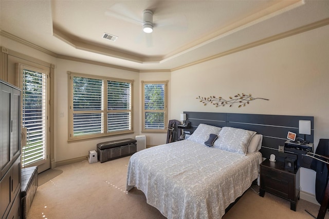 bedroom featuring carpet flooring, visible vents, a ceiling fan, access to outside, and a tray ceiling