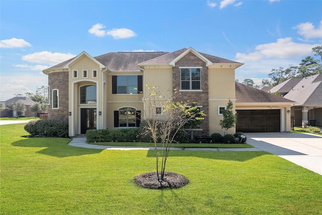 view of front of house with stone siding, concrete driveway, and a front yard