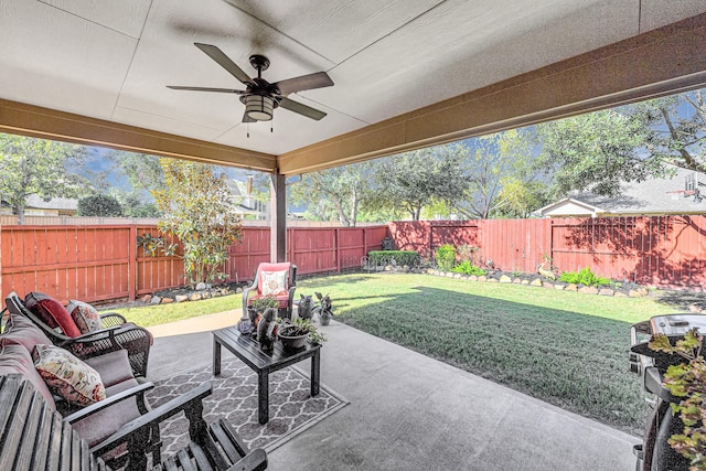 view of patio featuring ceiling fan