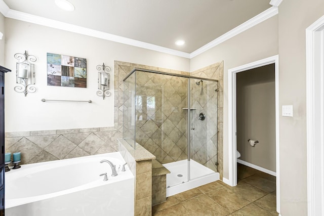 bathroom with tile patterned floors, toilet, ornamental molding, and plus walk in shower