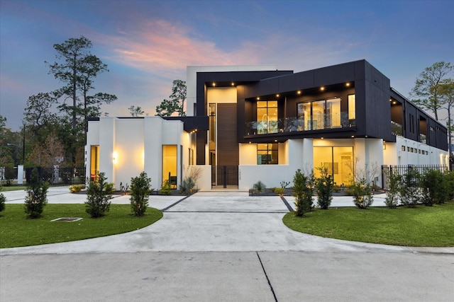 modern home with a lawn