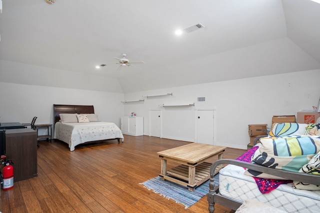 bedroom with lofted ceiling, ceiling fan, and dark hardwood / wood-style flooring