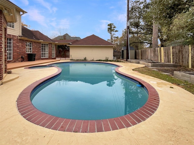 view of pool featuring a patio area