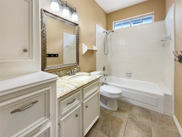 18418 Forest Elms Dr, Spring, TX 77388 - bathroom with vanity, washtub / shower combination, tile patterned floors, and toilet