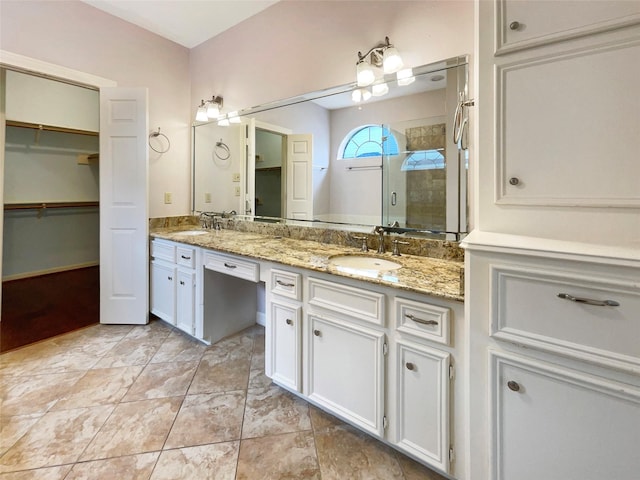 18418 Forest Elms Dr, Spring, TX 77388 - full bath featuring double vanity, a sink, a walk in closet, and a shower stall
