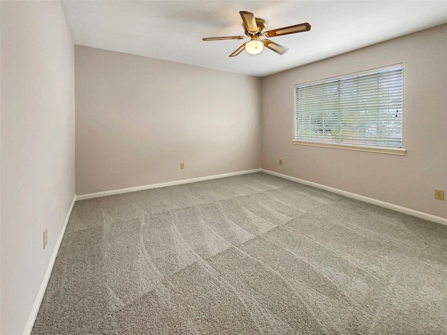 18418 Forest Elms Dr, Spring, TX 77388 - unfurnished room featuring baseboards, carpet flooring, and ceiling fan