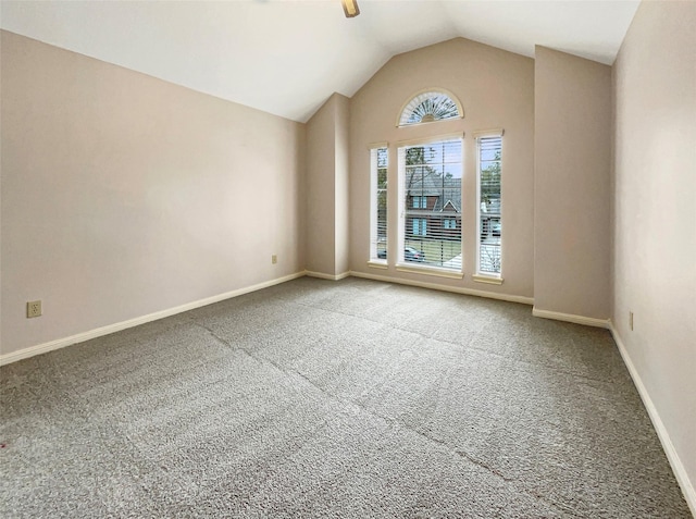 18418 Forest Elms Dr, Spring, TX 77388 - carpeted empty room featuring baseboards and vaulted ceiling