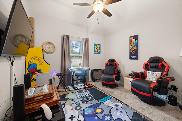 game room with carpet flooring and ceiling fan