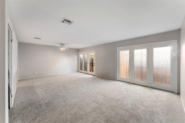 carpeted empty room with ceiling fan