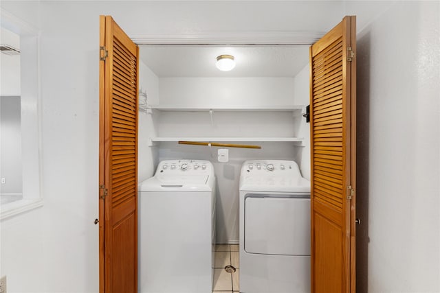 laundry room featuring washer and clothes dryer