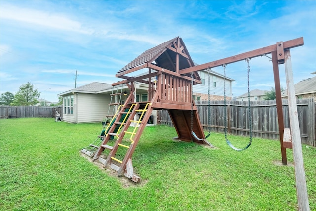 view of jungle gym with a lawn