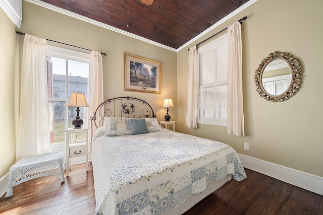 bedroom with hardwood / wood-style floors, ornamental molding, and wooden ceiling