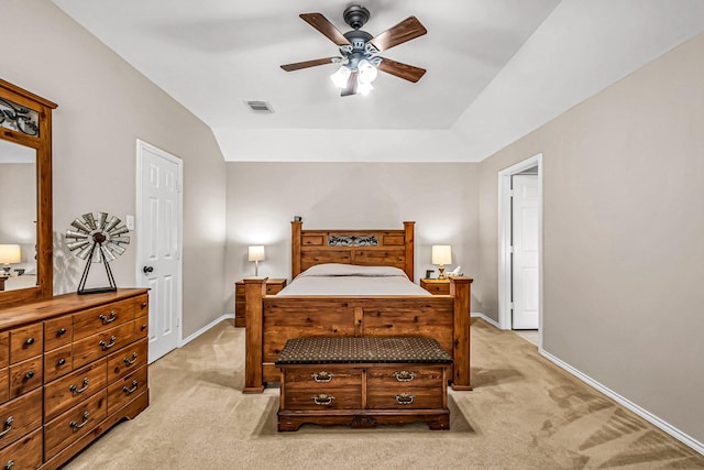 carpeted bedroom with ceiling fan and lofted ceiling